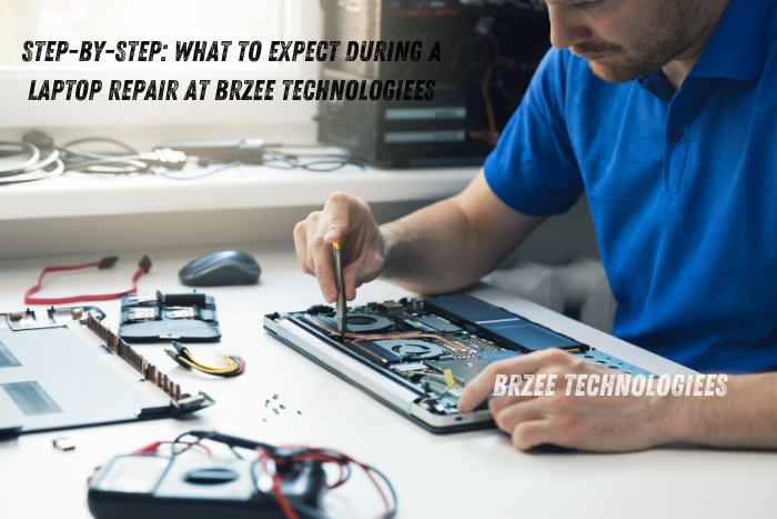 Technician carefully disassembling a laptop for repair at BrZee Technologiees in Coimbatore, ensuring expert handling and quality service for your tech needs