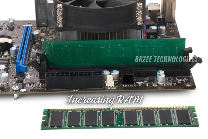 Close-up of a desktop computer motherboard with RAM sticks, highlighting the process of increasing RAM. Enhance your computer's performance with quality RAM upgrades from BrZee Technologiees in Gandhipuram, Coimbatore