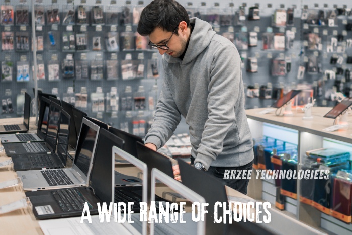 Customer browsing a wide range of laptops at BrZee Technologiees in Gandhipuram, Coimbatore, known for offering an extensive selection of quality laptops and tech products to suit every need and budget.