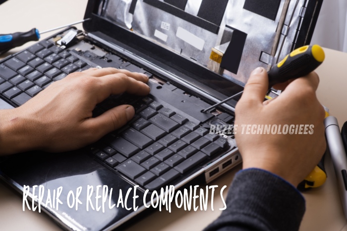 Technician repairing or replacing components of a laptop keyboard at BrZee Technologiees, Gandhipuram, Coimbatore. Expert in affordable laptop repairs, component replacement, and chip-level services for improved device performance