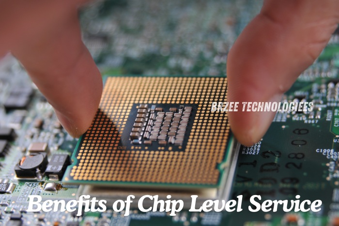 Technician performing precise chip level service on a computer motherboard at BrZee Technologiees, Gandhipuram, Coimbatore. Specializing in advanced repair services to improve system performance and extend the life of your devices